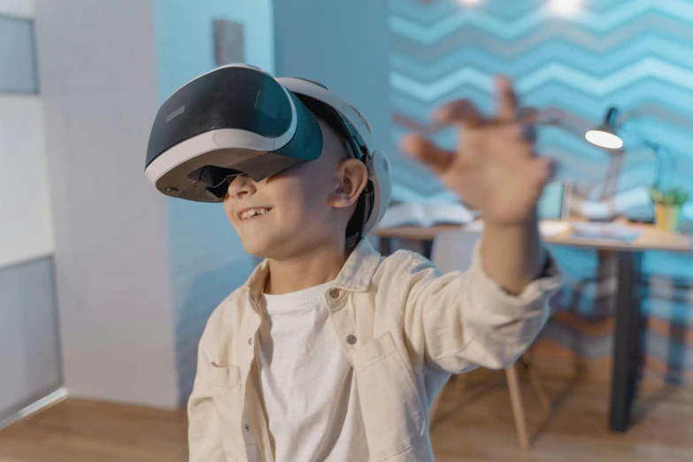 a young boy wearing a virtual reality headset, pexels, waving, vray tracing, futuristic product design, oled visor over eyes