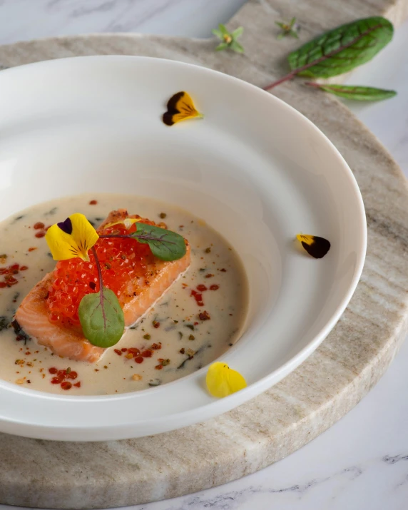 a close up of a plate of food on a table, inspired by Charles Le Roux, unsplash, salmon khoshroo, soup, square, thumbnail