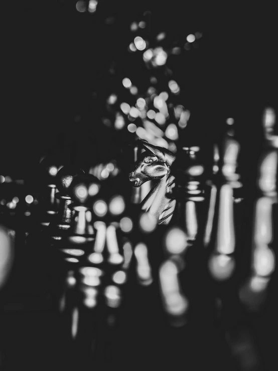 a black and white photo of chess pieces, a black and white photo, by Kristian Kreković, cinematic. by leng jun, deep bokeh, hidden face, night. by greg rutkowski