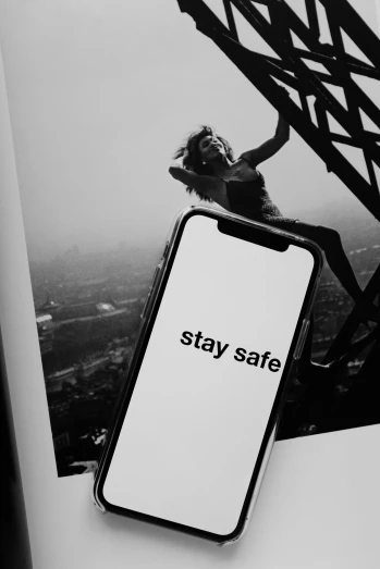 a cell phone sitting on top of a book, a black and white photo, happening, worksafe. instagram photo, slay, woman, wallpaper aesthetic