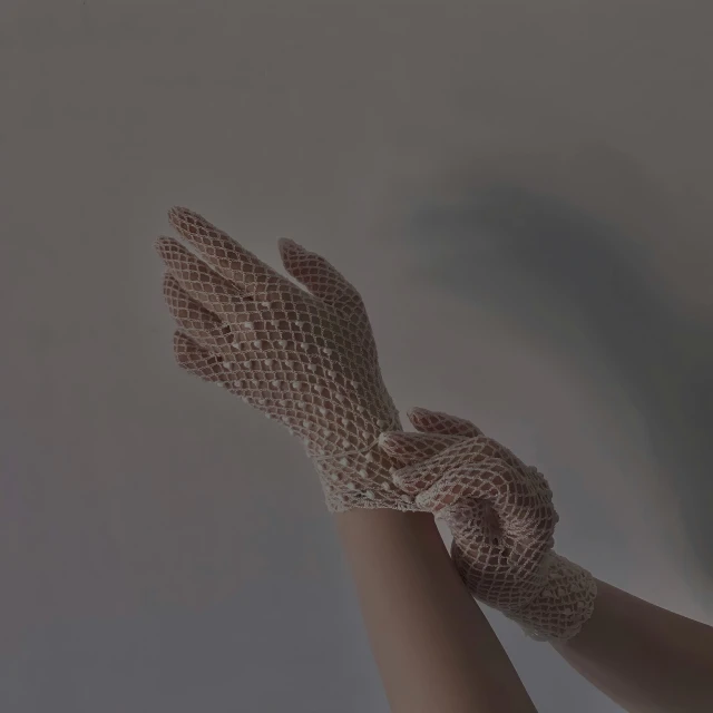 a close up of a glove on a mannequin mannequin mannequin mannequin mannequin mannequin manne, an album cover, inspired by Elsa Bleda, unsplash, crochet skin, background image