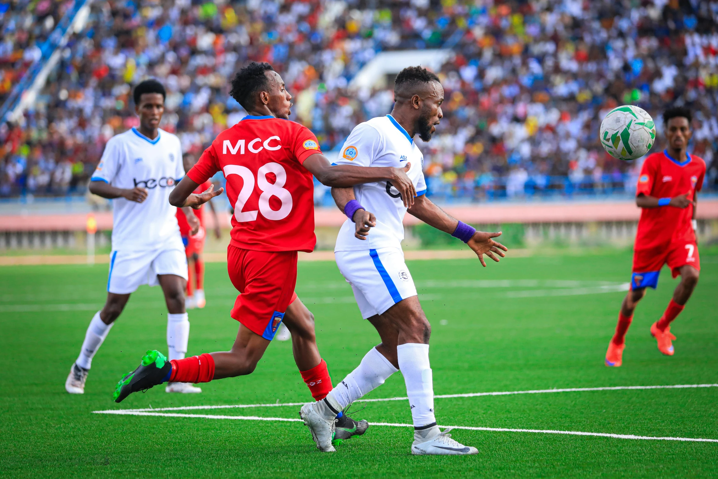 a group of young men playing a game of soccer, by Milton Menasco, pexels, process art, somalia, 😭🤮 💔, actress, ney matogrosso with malice