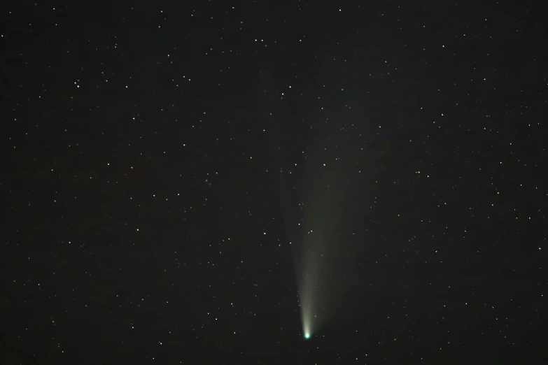 a comet shines brightly in the night sky, a digital rendering, by Carey Morris, pexels, hurufiyya, light cone, gray, short spout, 2022 photograph