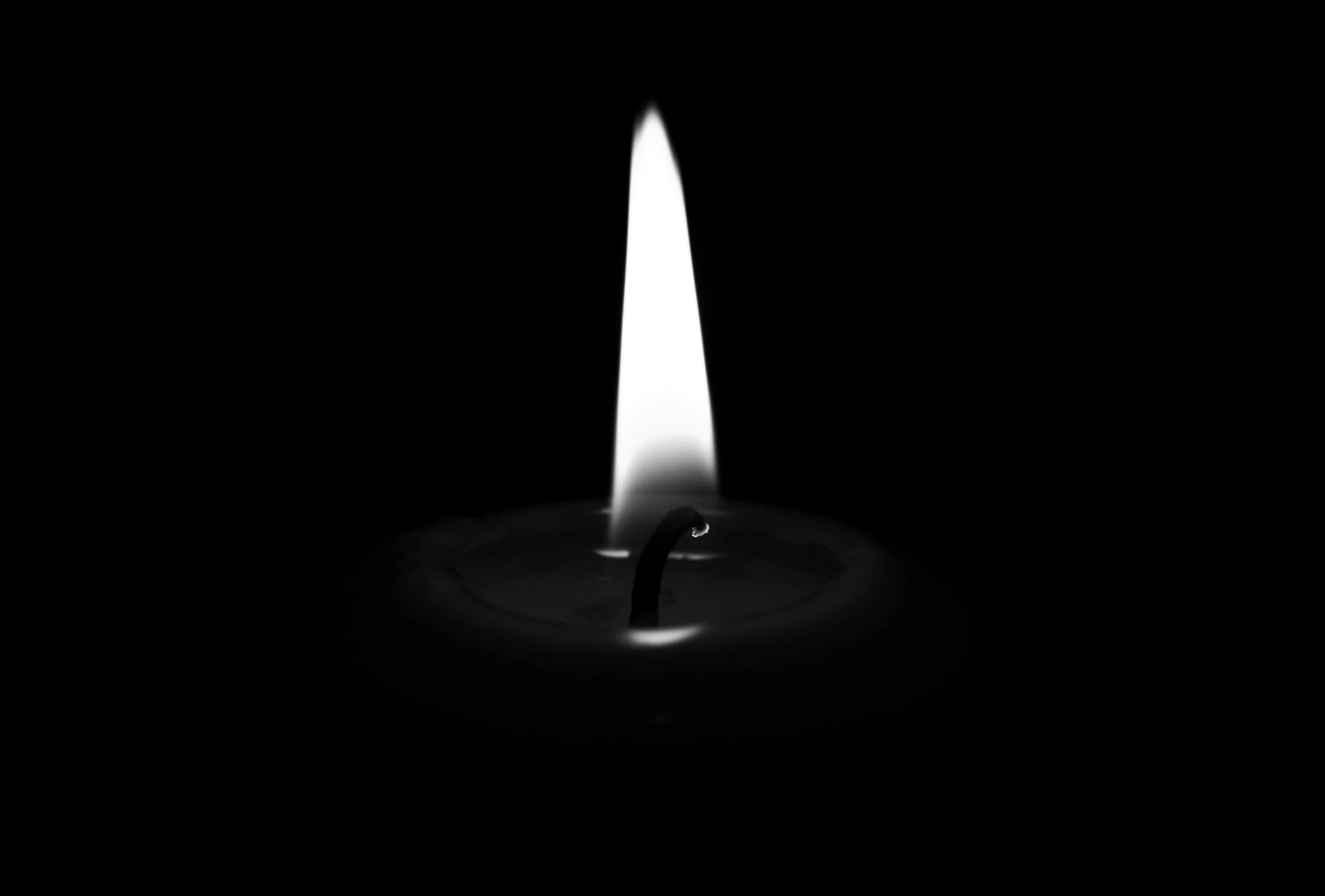 a single candle is lit in the dark, a black and white photo, by Jan Rustem, pixabay, minimalism, black fluid simulation, 15081959 21121991 01012000 4k, tear drop, arson