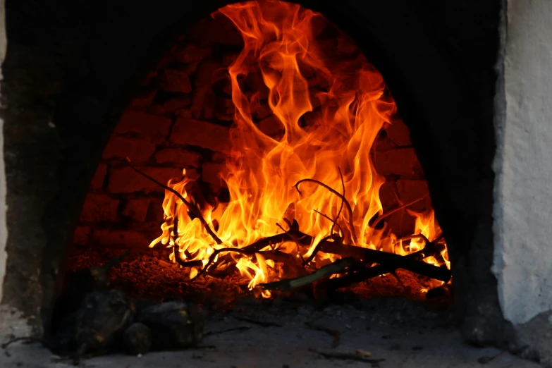 a close up of a fire in a brick oven, pexels contest winner, hurufiyya, avatar image, background image, ground level shot, profile picture