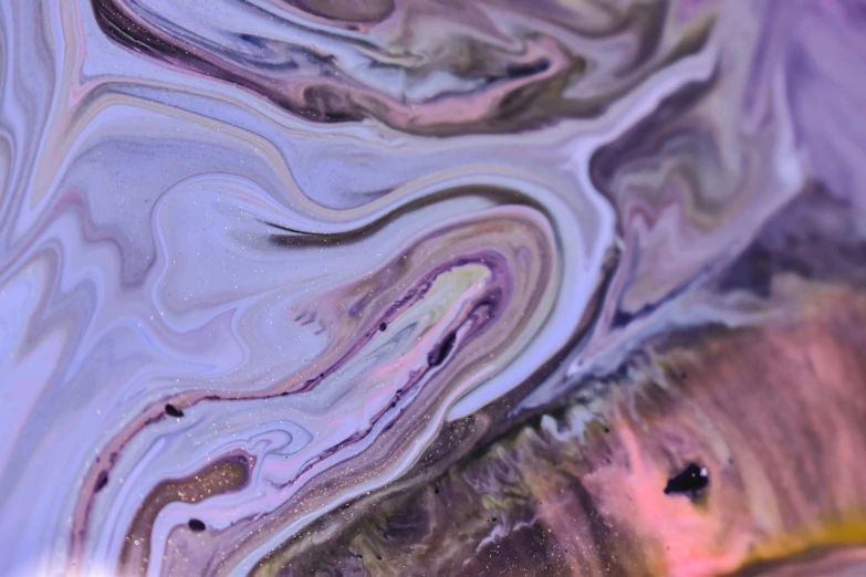 a close up of a fish in a body of water, by Sophie Pemberton, trending on unsplash, process art, marbled swirls, made of liquid purple metal, earth and pastel colors, “ femme on a galactic shore