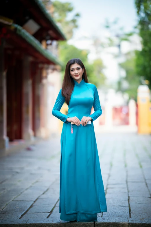 a woman in a blue dress posing for a picture, inspired by Lam Qua, instagram, ao dai, 15081959 21121991 01012000 4k, promo image, turqouise