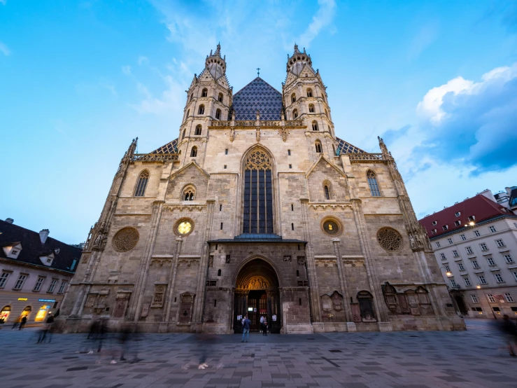 a large cathedral sitting in the middle of a city, pexels contest winner, viennese actionism, square, medieval photograph, early evening, with intricate details