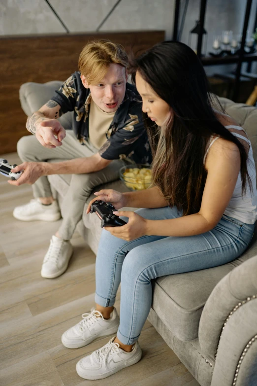 a man and a woman sitting on a couch playing video games, inspect in inventory image, instagram post, intense, college students