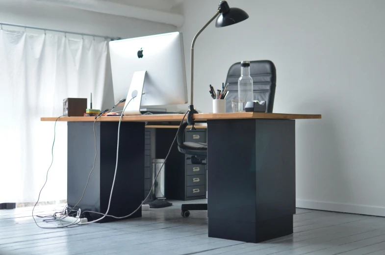 a computer sitting on top of a wooden desk, by Jan Tengnagel, hyperrealism, ikea, in office, rectangle, colour corrected