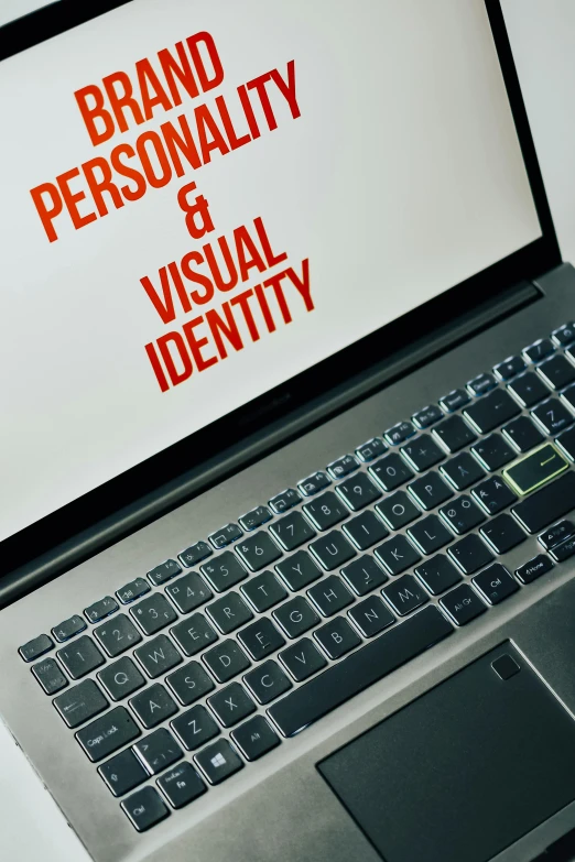 a laptop with the words brand personality and visual identity on the screen, visual art, paul barson, your personal data avatar, barbara kruger, visual-key