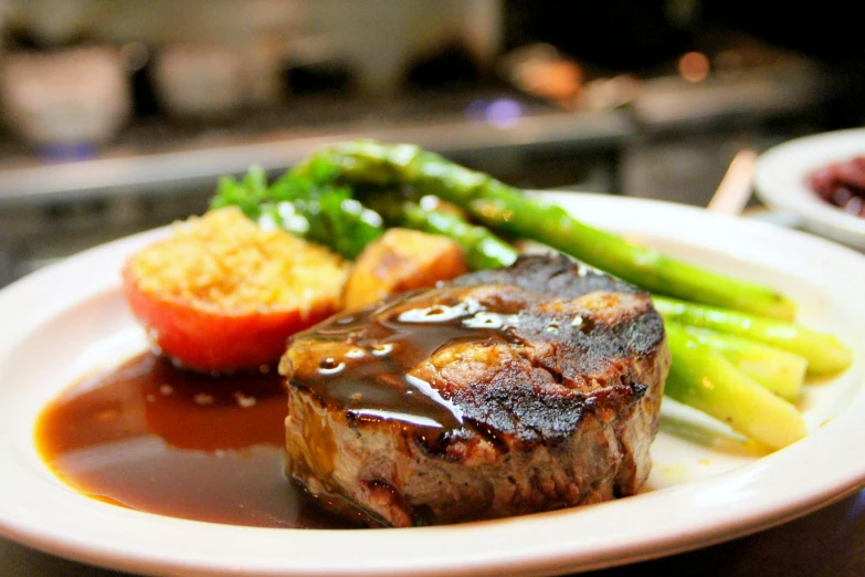 a close up of a plate of food on a table, steak, profile image, fan favorite, diner food