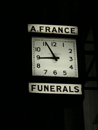 a large clock mounted to the side of a building, an album cover, by Ian Hamilton Finlay, renaissance, funeral, ansel ], french resistance, (night)