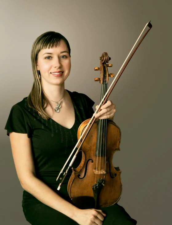 a woman in a black shirt holding a violin, by Robert Medley, avatar image