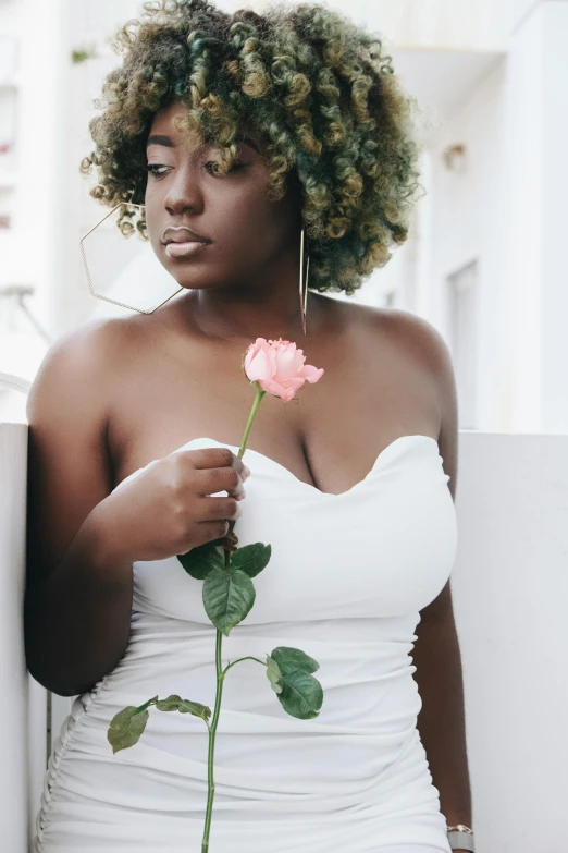 a woman in a white dress holding a pink rose, by Dulah Marie Evans, unsplash, natural hair, wearing white leotard, plus-sized, with grey skin