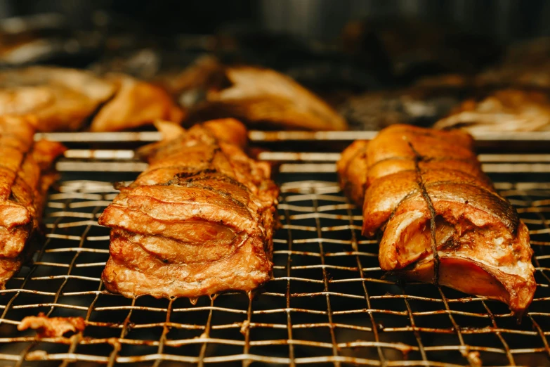 a bunch of food that is on a grill, unsplash, mingei, “pig, 3 / 4 wide shot, crisp details, piping