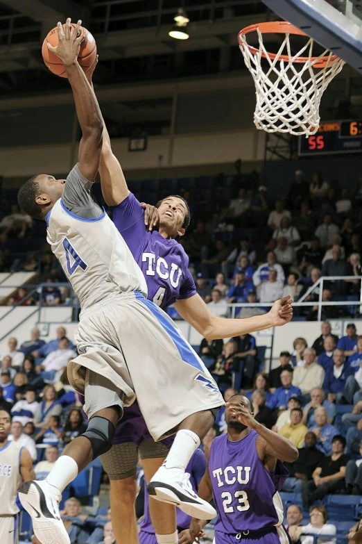 a group of men playing a game of basketball, purple and blue, tyler miles lockett, attacking, taken in the late 2010s