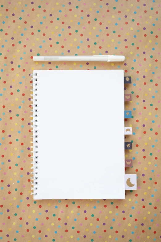 a notepad sitting on top of a piece of paper, a picture, in a shapes background, thumbnail, muy dotado, product image