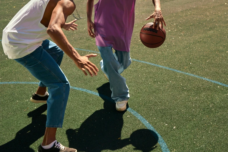 a couple of young men playing a game of basketball, by Carey Morris, trending on dribble, full frame image, hyperrealistic image, 2000s photo, on ground