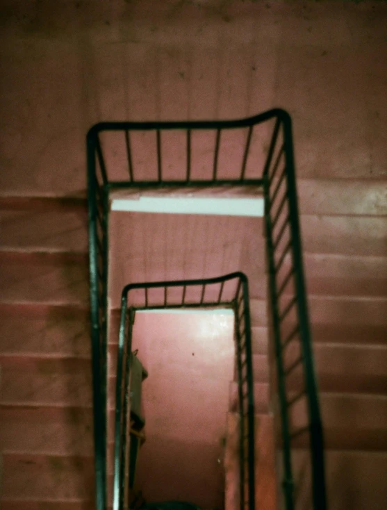 a set of stairs leading up to a bathroom, by Elsa Bleda, faded pink, 35 mm, sprial, blank stare”