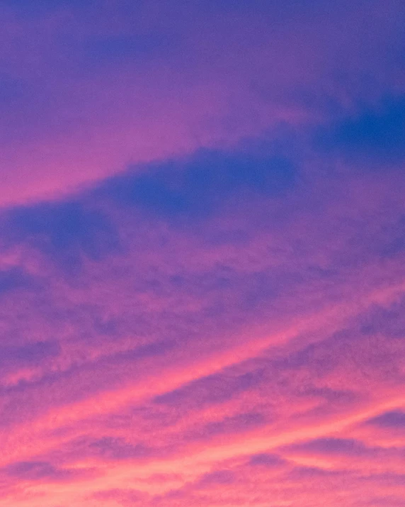 a plane that is flying in the sky, by Carey Morris, pexels contest winner, aestheticism, violet and pink palette, sunset panorama, dayglo pink blue, # nofilter