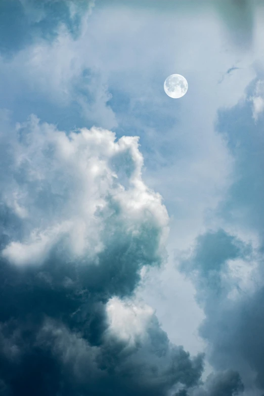 a plane flying through a cloudy sky with a full moon in the background, by Alison Geissler, trending on unsplash, mikko lagerstedt, cumulus clouds, cloud in the shape of a dragon, noon