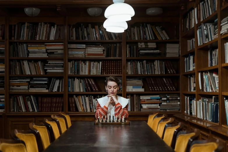 a woman playing a game of chess in a library, a portrait, by Emma Andijewska, unsplash contest winner, sitting on the table, centered in portrait, concept photo, reykjavik junior college