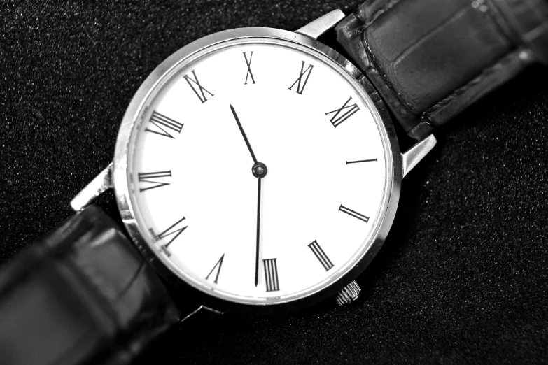a close up of a wrist watch with roman numerals, pexels, gradient black to silver, white soft leather model, thumbnail, computer - generated