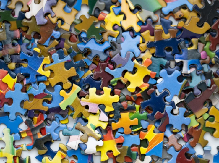 a pile of puzzle pieces sitting on top of a table, a jigsaw puzzle, by Matija Jama, pexels, precisionism, hyperdetailed colourful, electronic components, mc escher tessellation, incredibly beautiful