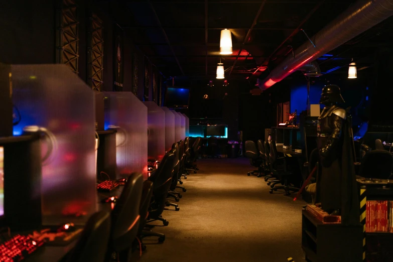 a row of computer monitors sitting next to each other, by Ryan Pancoast, subtle fog and mood lighting, a busy arcade, d. i. y. venue, 2 5 6 x 2 5 6 pixels