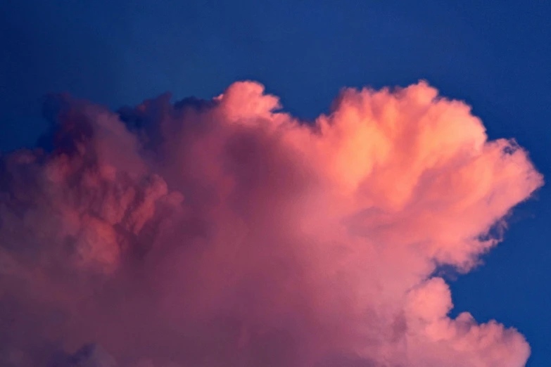 a jetliner flying through a pink cloud filled sky, an album cover, by Jan Rustem, unsplash, romanticism, giant cumulonimbus cloud, light red and deep blue mood, late summer evening, made of cotton candy