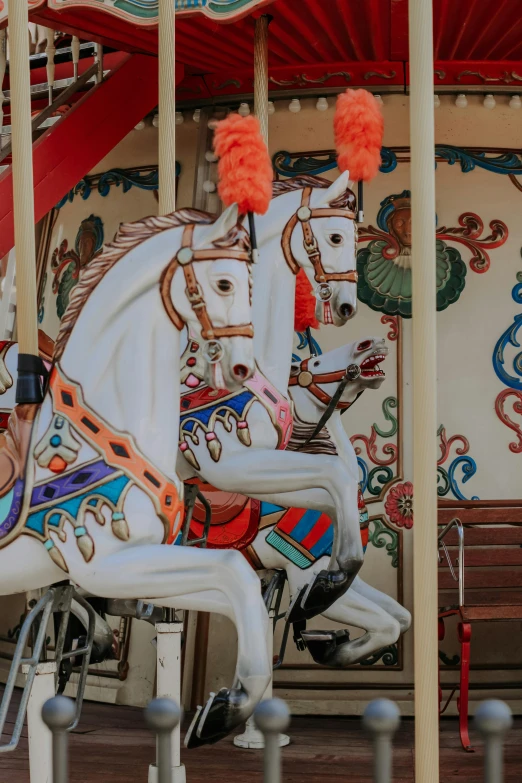 a close up of a horse on a carousel