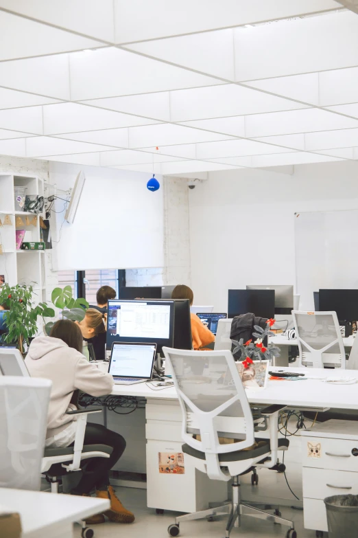 a group of people working at desks in an office, unsplash, inside white room, behance lemanoosh, slightly pixelated, panoramic