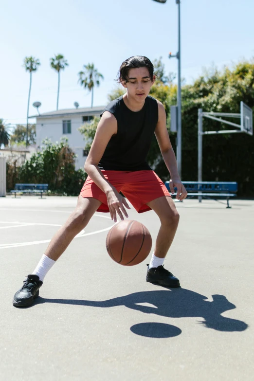 a young man dribbling a basketball on a court, by Gavin Hamilton, trending on dribble, asher duran, tommy 1 6 years old, lookbook, profile pic