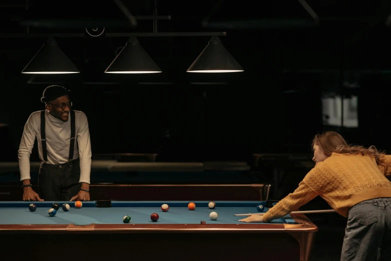 a couple of people playing a game of pool, a portrait, unsplash contest winner, cinematic outfit photo, 15081959 21121991 01012000 4k, still from a live action movie, under a spotlight