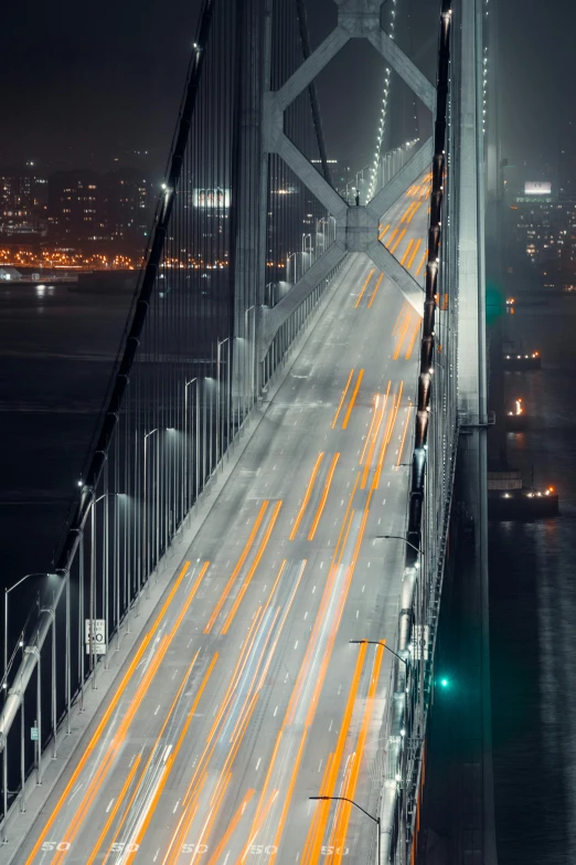 an aerial view of the golden gate bridge at night, pexels contest winner, digital art, cars on the road, bridges and railings, 2 0 2 2 photo, canvas