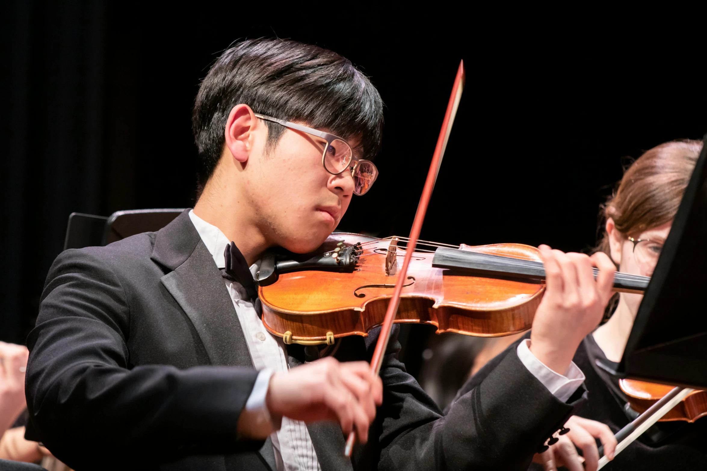 a man in a tuxedo playing a violin, student, seseon yoon, square, file photo