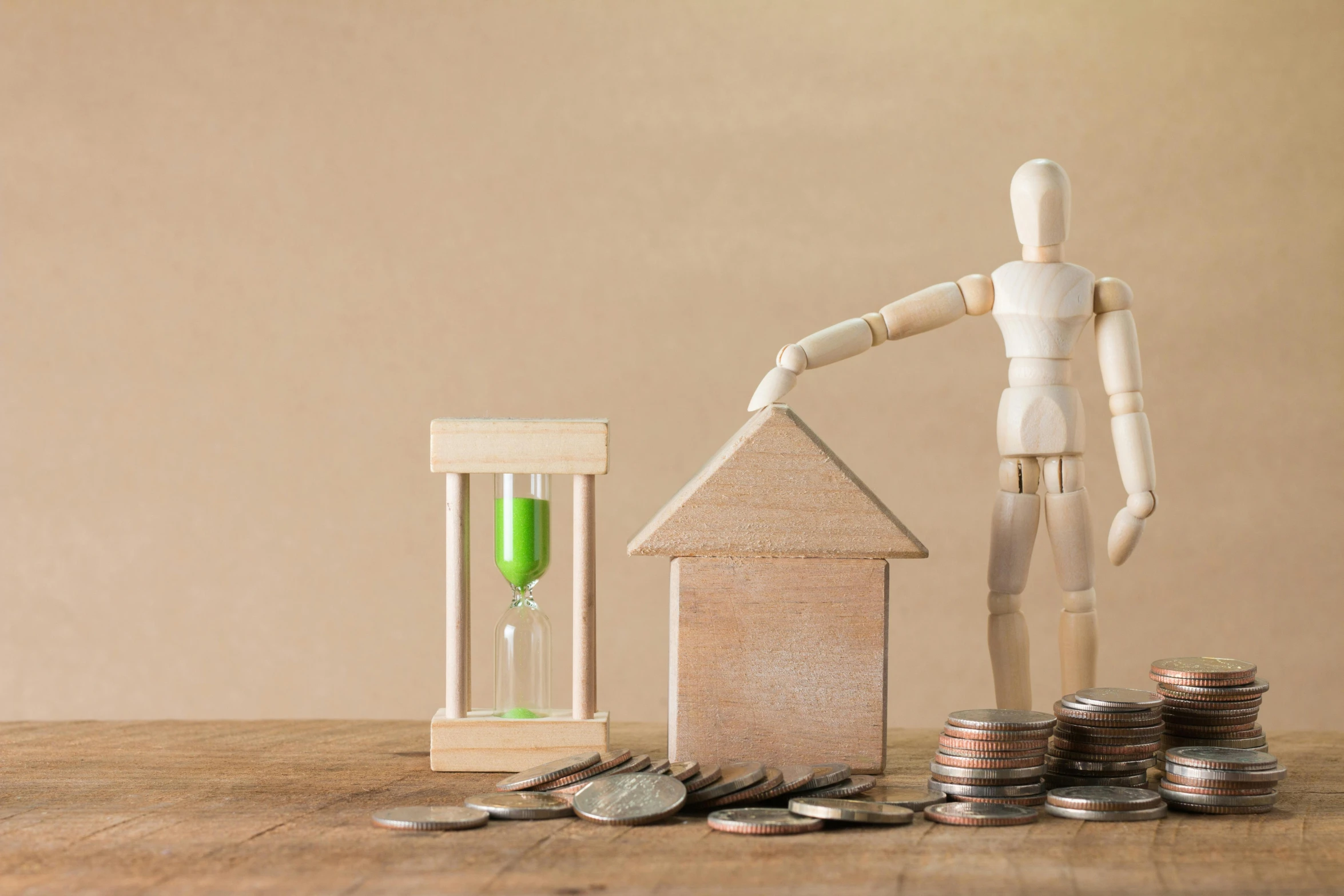 a wooden mannequin standing next to a pile of coins, hour glass, people looking at a house, detailed product image, at home