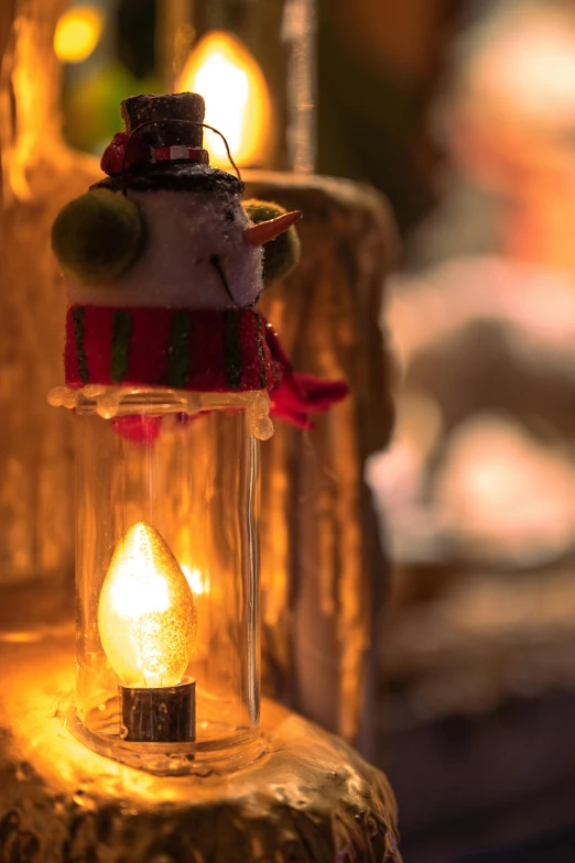 a lit candle sitting on top of a wooden table, icicles, elves house, emerging from a lamp, slide show