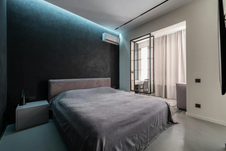 a bed room with a neatly made bed and a flat screen tv, inspired by Elsa Bleda, unsplash contest winner, light and space, dark concrete room, silver and cool colors, bladerunner apartment, solid gray