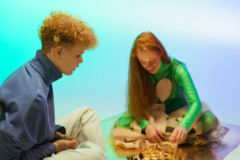 a man and a woman playing a game of chess, an album cover, inspired by Anna Füssli, trending on pexels, visual art, cyan and green, claymation, sadie sink, in a museum room