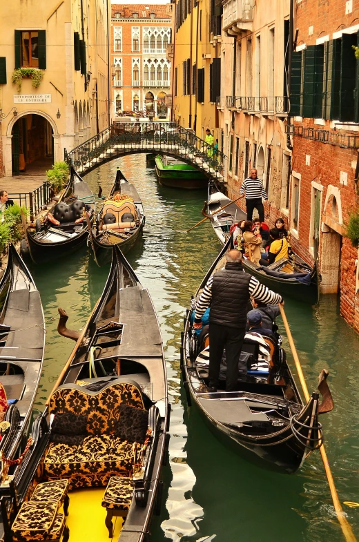 a couple of boats that are sitting in the water, by Bernie D’Andrea, pexels contest winner, renaissance, crowded streets, gondola, panoramic, high angle shot