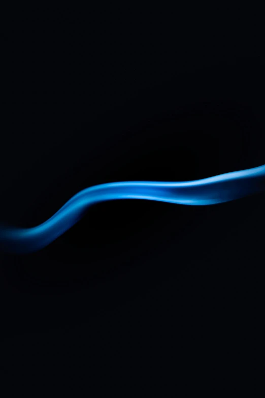 a close up of a toothbrush on a black background, by Adam Marczyński, symbolism, glowing blue veins, flowing curves, smoke trail, serpent