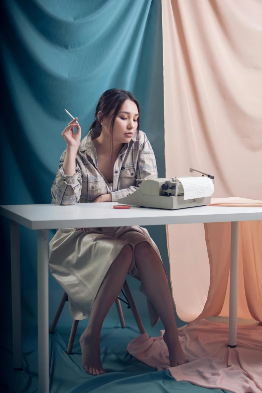 a woman sitting at a table with a typewriter, inspired by Elsa Bleda, pexels contest winner, aestheticism, sad woman smoking a gigarette, wearing business casual dress, in pastel shades, amy sol in the style of