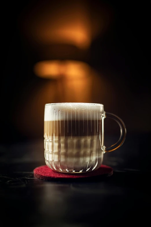 a close up of a cup of coffee on a table, inspired by François Bocion, smoked layered, starlit, malaysian, frosted glass