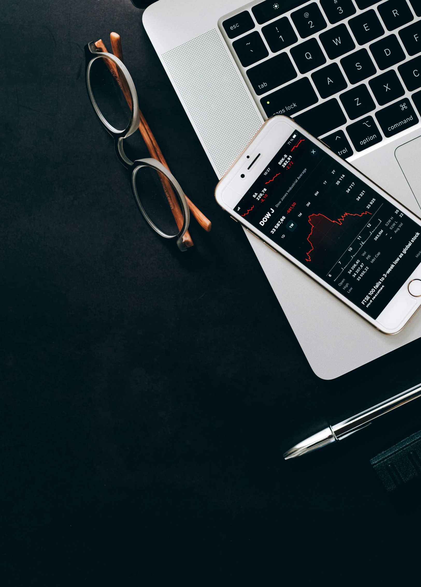 a laptop computer sitting on top of a desk next to a cell phone, by Sebastian Vrancx, trending on unsplash, analytical art, trading stocks, square, black theme, professional iphone photo