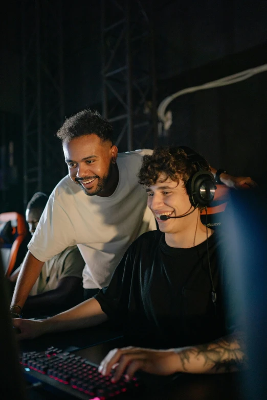 a man and a woman sitting in front of a computer, wearing a gaming headset, bruh moment, ( ( theatrical ) ), two young men