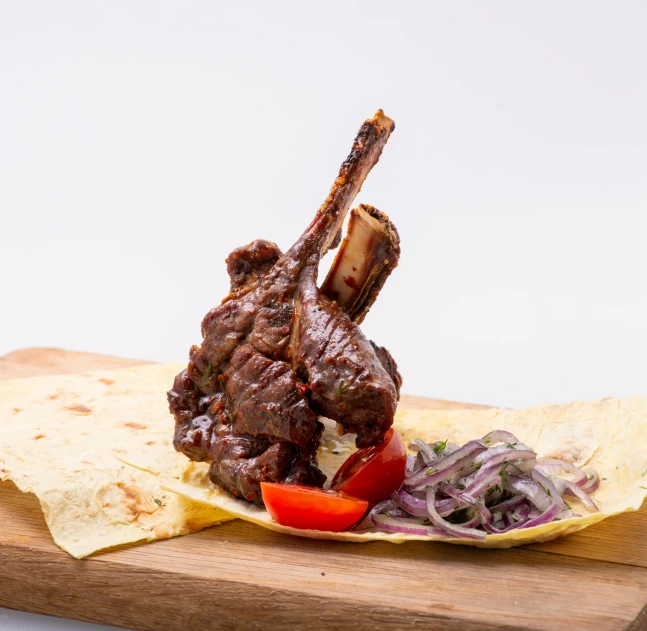 a close up of a plate of food on a cutting board, holding a goat head staff, greek ameera al taweel, high quality product image”, without background