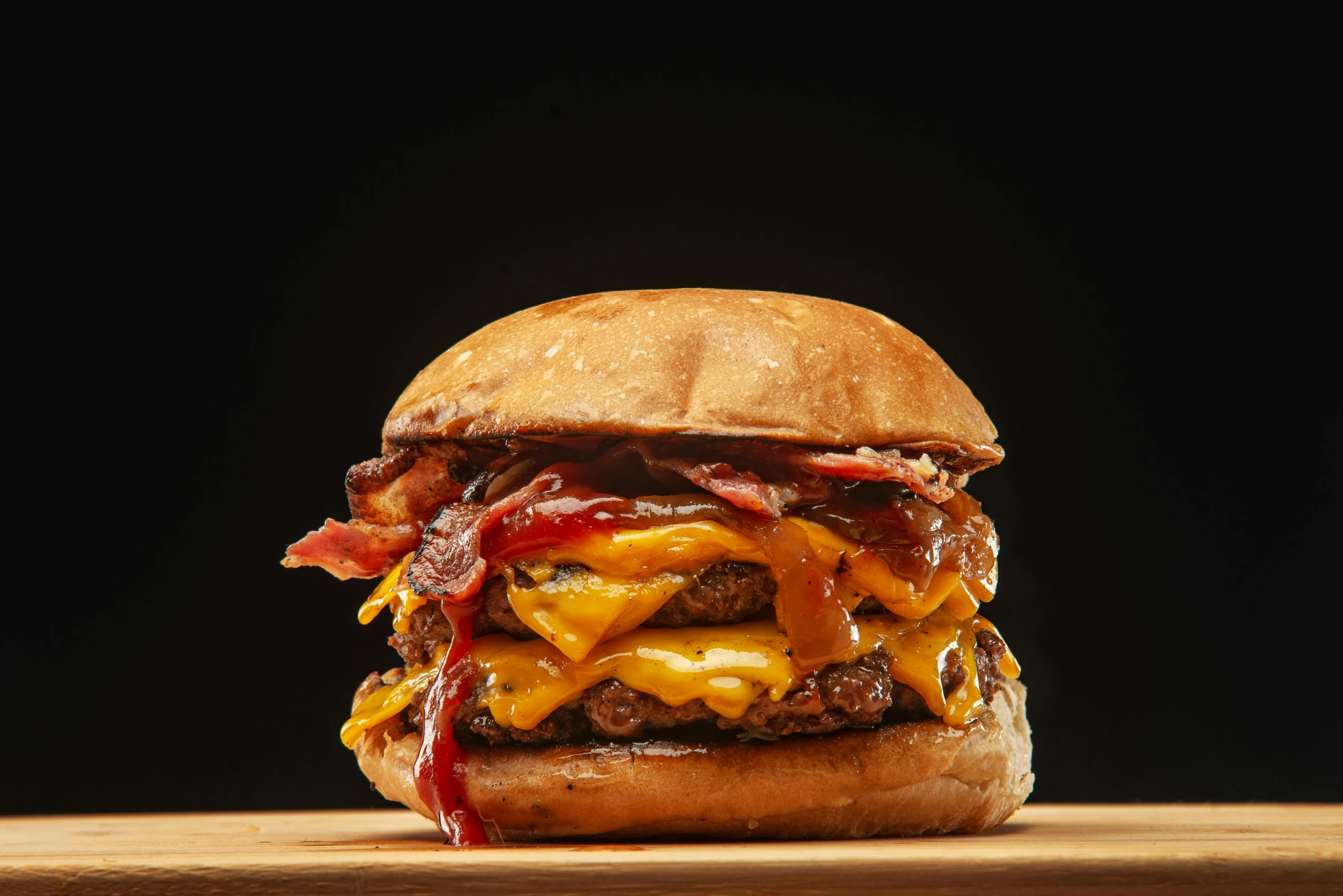 a cheeseburger sitting on top of a wooden cutting board, a portrait, by Joe Bowler, pexels, hegre, bacon, 3/4 front view, pbr