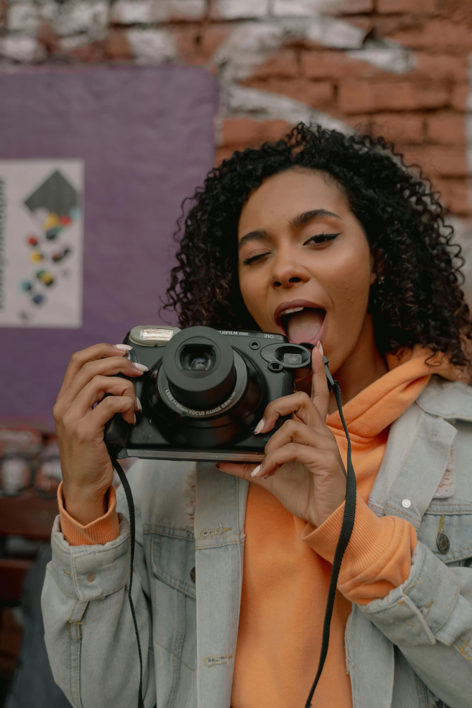 a woman taking a picture with a camera, happening, ashteroth, shot with sony alpha 1 camera, sneering at the camera, fujifilm x100v